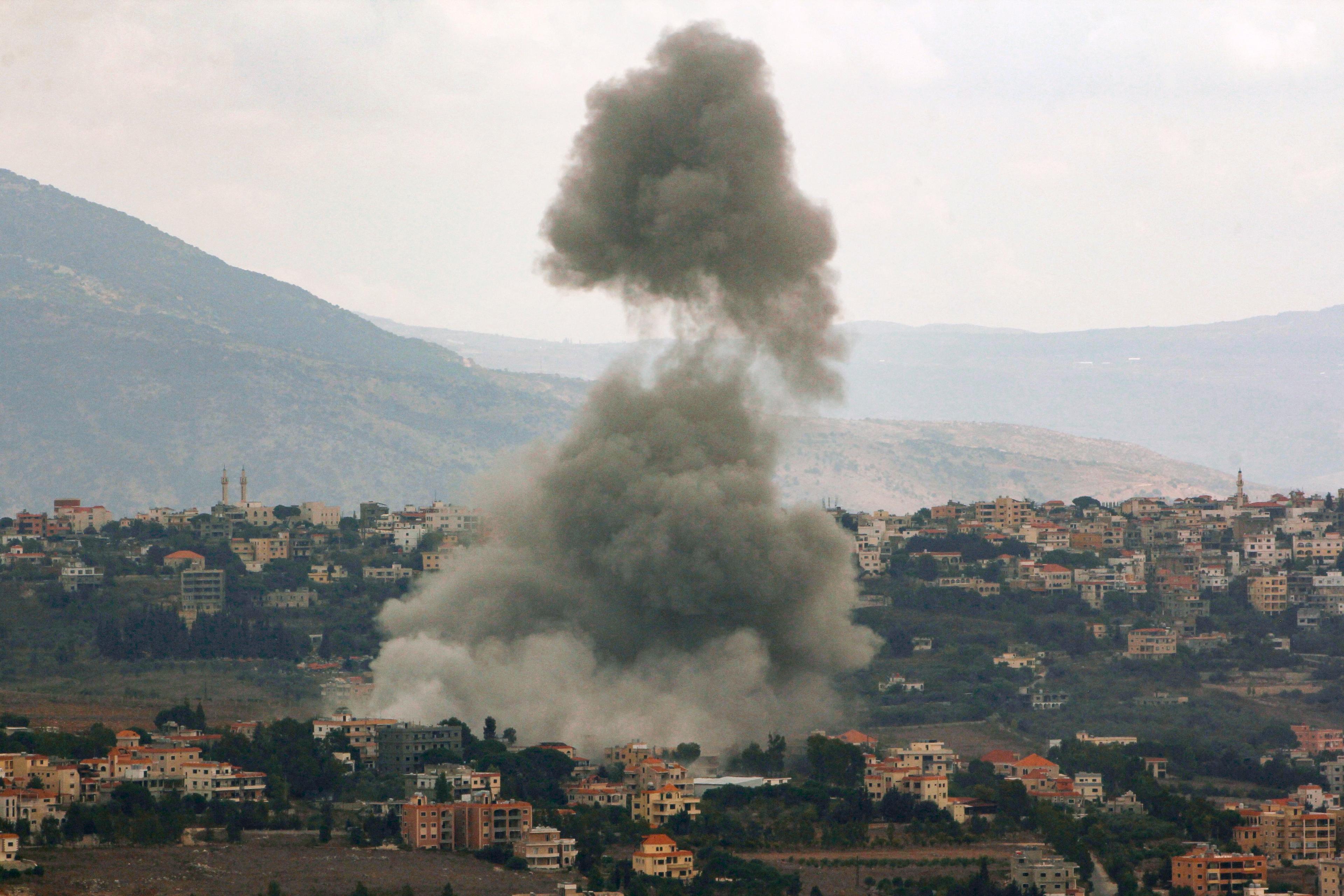 Smoke billows from the site of an Israeli air strike in the Lebanese village of Khiam, near the Lebanon-Israel border, on September 23, 2024. The Israeli military on September 23 told people in Lebanon to move away from Hezbollah targets and vowed to carry out more "extensive and precise" strikes against the Iran-backed group. (Photo by Rabih DAHER / AFP) (Photo by RABIH DAHER/AFP via Getty Images)
